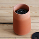 Illustration for article titled A Simple Clay Pot Could Replace Your Noisy Air Conditioner